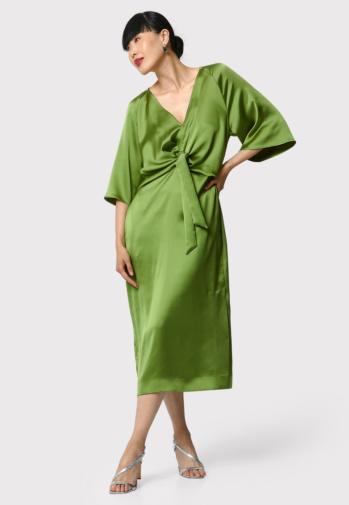 Showcase your grace and elegance with the Ailbhe Chartreuse Green Dress. The luxurious satin material drapes beautifully, while the front ties add sophistication. With practical side seam pockets and an alluring side slit, this mid-calf dress is the perfect choice for any event. Elevate your style with this modernized twist on classic occasionwear.