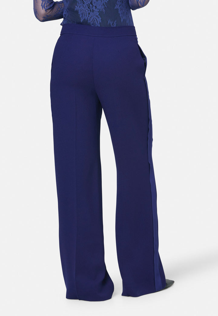 model wearing Aline Ink Blue Tux Trouser
