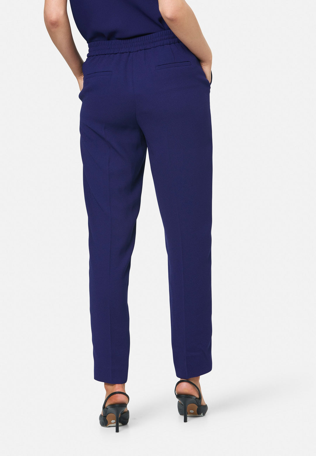 model wearing Ann Ink Blue Trouser