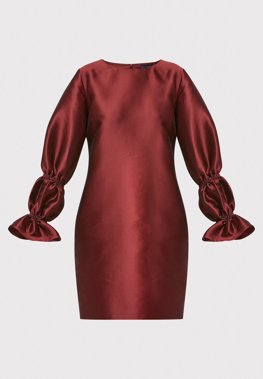 Step into the spotlight with Aurora, a chic short shift dress in a stunning mahogany red hue. This stylish piece features a statement puff-ball sleeve , side seam pockets, and falls above the knee. Crafted from a silk blend taffeta. Make a grand entrance with Aurora.