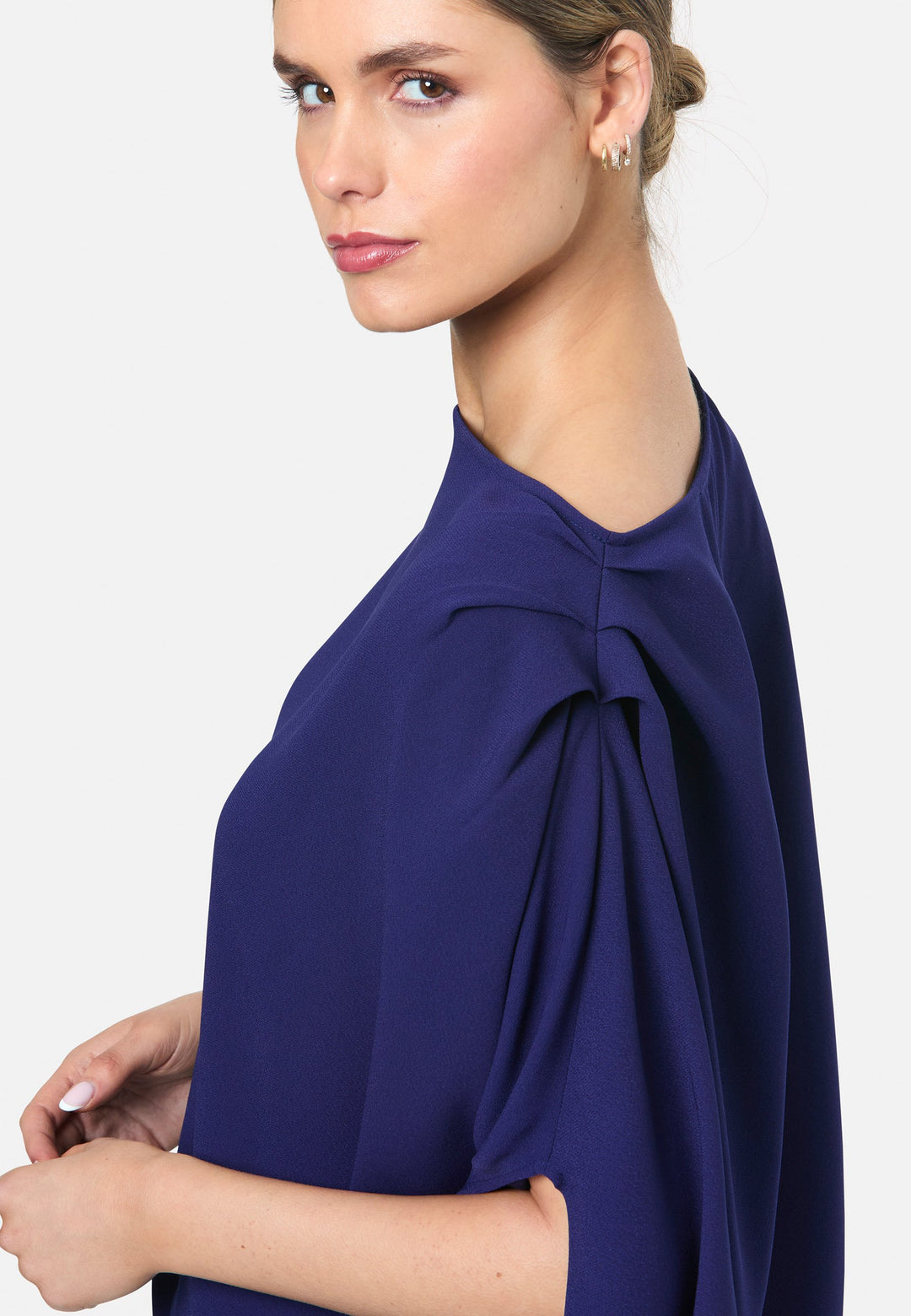 model wearing Berna Ink Blue Blouse