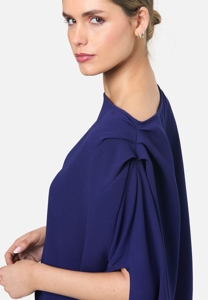 model wearing Berna Ink Blue Blouse