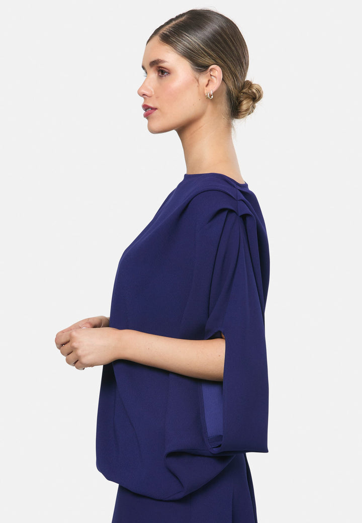 model wearing Berna Ink Blue Blouse