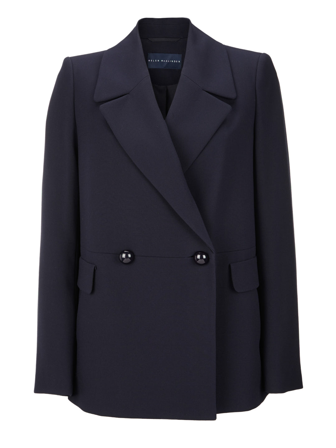 Wide Lapelled, double-breasted pea coat in dark navy. This versatile piece works in many ways. Wear it over jeans with heels, or for a new take on the tux team it with our slim Jill pant.