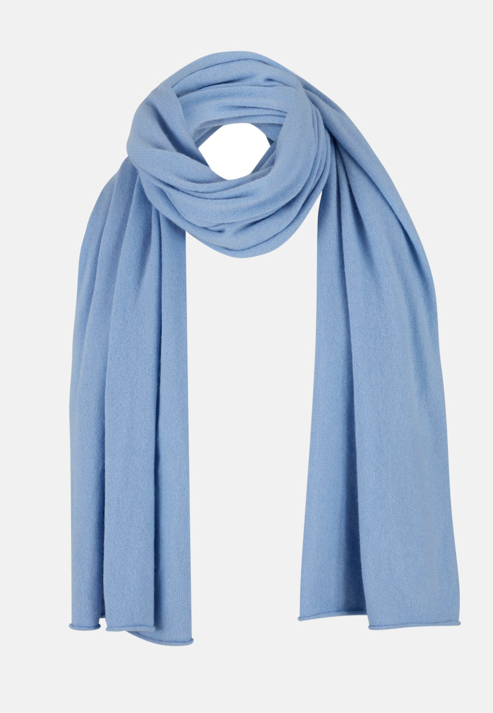 Wrap yourself in warmth and style this fall with our generous cashmere travel wrap. Crafted from the finest cashmere, this ultra-soft scarf measures 205x70 cm, offering perfect coverage for cool-weather layering. The elegant porcelain blue hue makes it a versatile, chic accessory for any outfit.