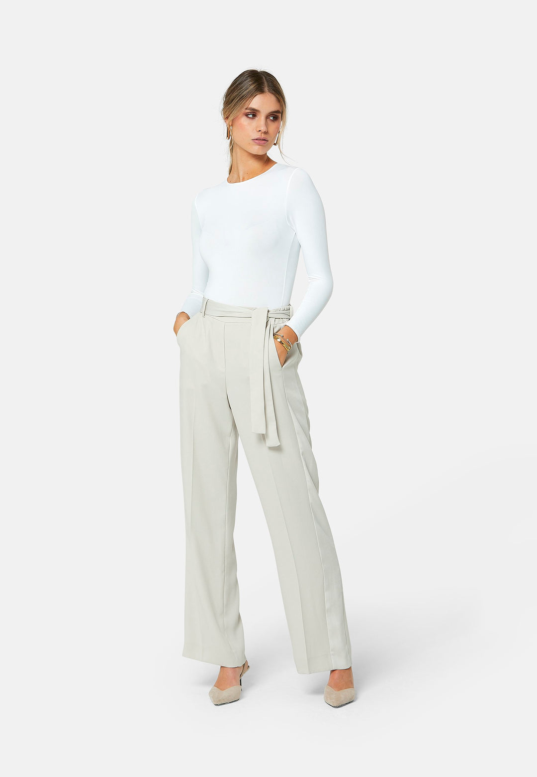 Delilah, Stone flat front straight leg trouser with side seam pockets in fluid satin back crepe. Feature a detachable self-fabric belt and a satin stripe along the side seam of the leg. Coordinate with the white timeless tops or matching Lal top for a relaxed take on 'after six' dressing.