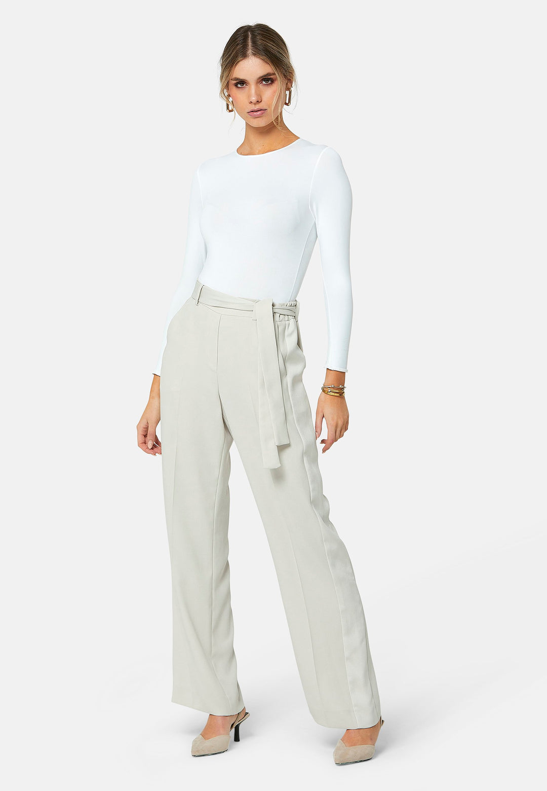 Delilah, Stone flat front straight leg trouser with side seam pockets in fluid satin back crepe. Feature a detachable self-fabric belt and a satin stripe along the side seam of the leg. Coordinate with the white timeless tops or matching Lal top for a relaxed take on 'after six' dressing.