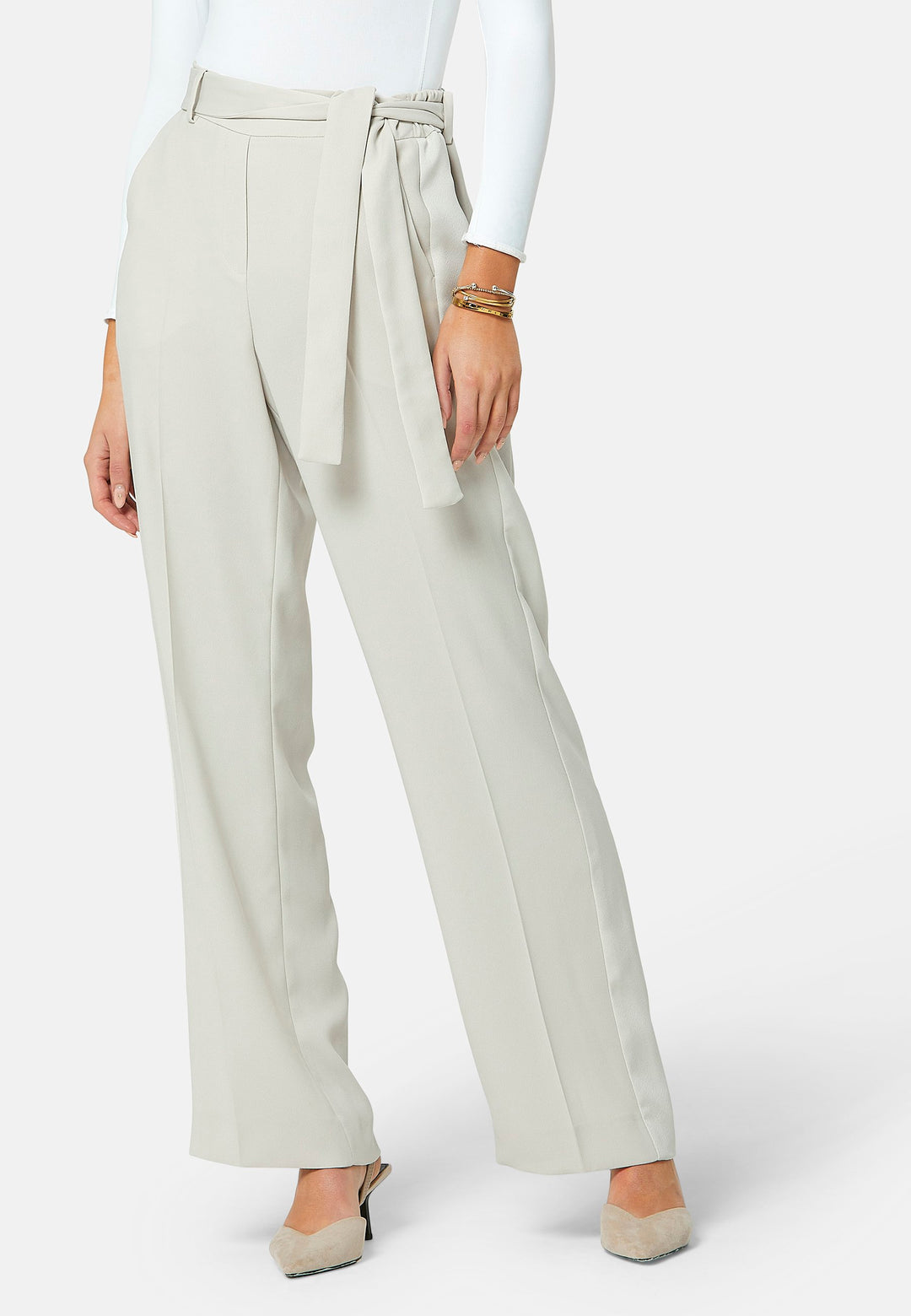 Delilah, Stone flat front straight leg trouser with side seam pockets in fluid satin back crepe. Feature a detachable self-fabric belt and a satin stripe along the side seam of the leg. Coordinate with the white timeless tops or matching Lal top for a relaxed take on 'after six' dressing.