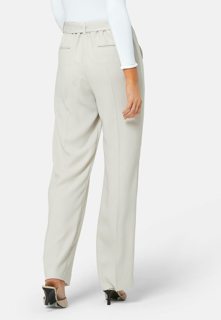 Delilah, Stone flat front straight leg trouser with side seam pockets in fluid satin back crepe. Feature a detachable self-fabric belt and a satin stripe along the side seam of the leg. Coordinate with the white timeless tops or matching Lal top for a relaxed take on 'after six' dressing.