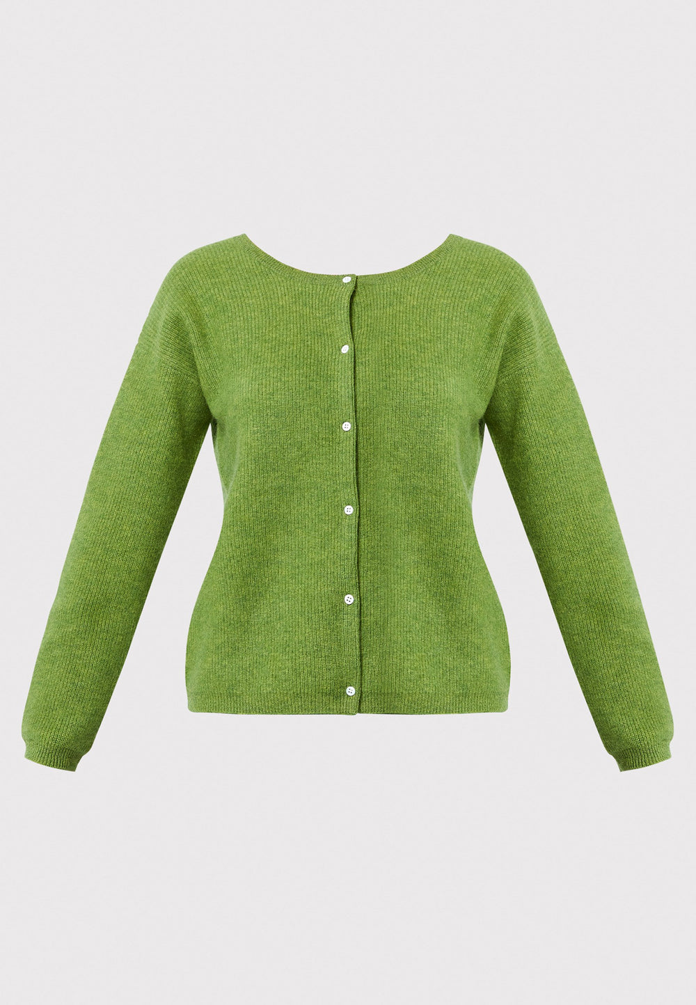 The Greta Cashmere Cardigan in Chartreuse Green offers a vibrant and stylish option for your wardrobe. This reversible piece features ribbed detailing and a tidy finish, allowing you to wear it as a button-back jumper or layer it as a cardigan over the Marlena Cashmere Sweater-Vest for a coordinated look. Made from soft and luxurious cashmere, the Greta Cardigan combines comfort with a pop of color, making it a standout piece for any fashion-forward wardrobe.