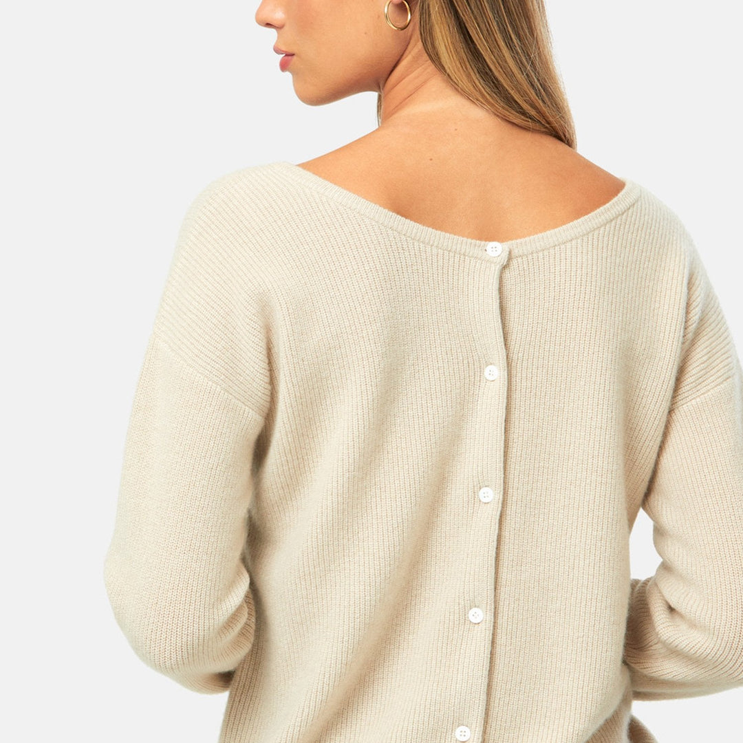 A versatile, reversible cardigan you can wear buttoned at the front or back, or pair with the matching Marlena top. Spun from pure cashmere with a plush, cloud-soft handle, it features a neat crew neckline, dropped shoulders and an easy, hip-skimming fit finished with fine rib trims.