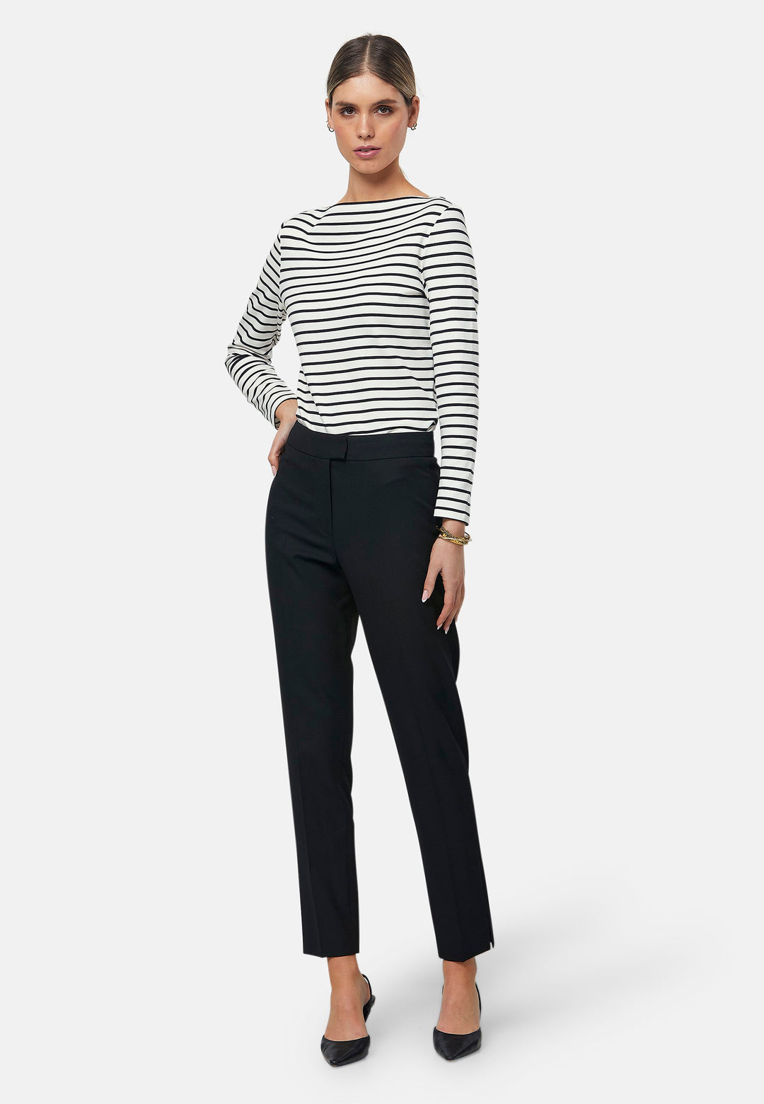 These classic narrow-leg trousers have a sleek, tailored fit. The clean front sits naturally at the waist and falls to an ankle-grazing length. Features jeet pockets, a high waist and slit on the hem. Pair with the Cassie Blazer for a professional look.