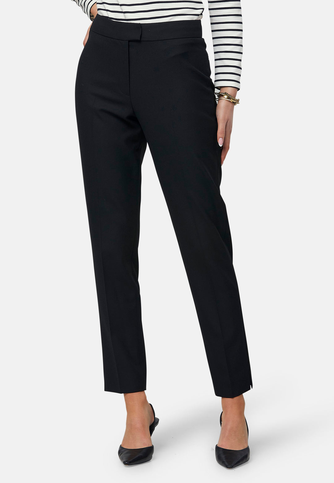 These classic narrow-leg trousers have a sleek, tailored fit. The clean front sits naturally at the waist and falls to an ankle-grazing length. Features jeet pockets, a high waist and slit on the hem. Pair with the Cassie Blazer for a professional look.