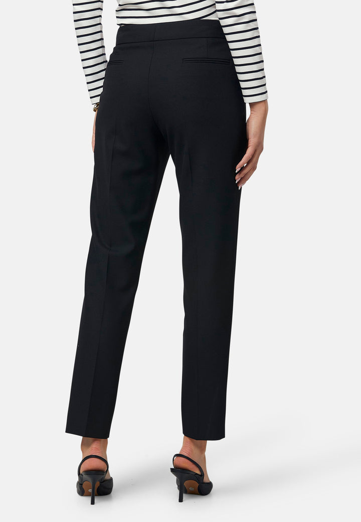 These classic narrow-leg trousers have a sleek, tailored fit. The clean front sits naturally at the waist and falls to an ankle-grazing length. Features jeet pockets, a high waist and slit on the hem. Pair with the Cassie Blazer for a professional look.