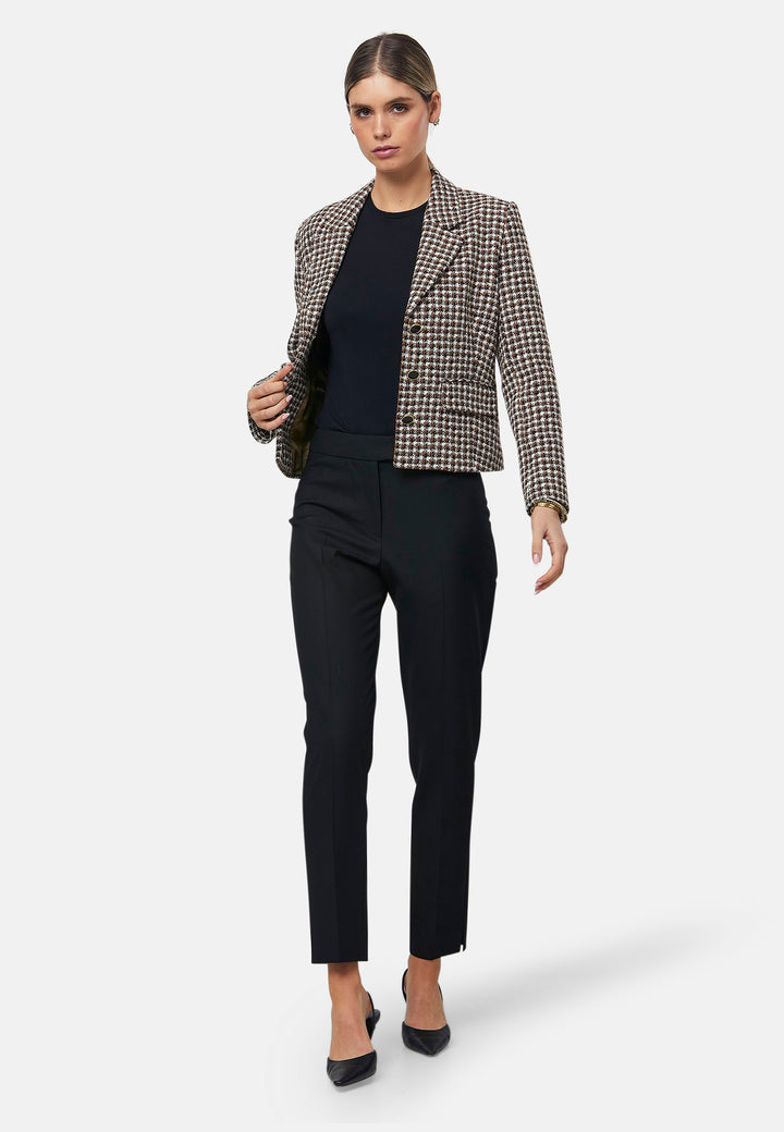 These classic narrow-leg trousers have a sleek, tailored fit. The clean front sits naturally at the waist and falls to an ankle-grazing length. Features jeet pockets, a high waist and slit on the hem. Pair with the Cassie Blazer for a professional look.