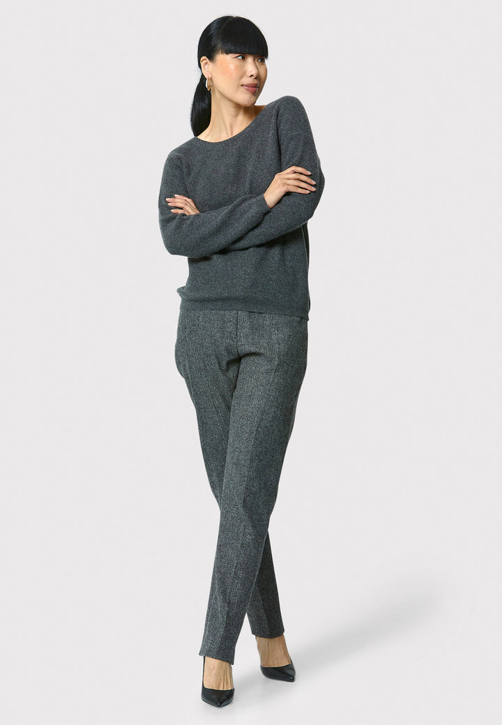 Introducing Jill in charcoal grey, made from a soft-touch wool blend. These classic narrow-leg trousers have a sleek, tailored fit and ankle-grazing length. The clean front sits naturally at the waist, with stylish details like a jet pocket and slit hem. Pair with the Cassie Charcoal Grey Blazer.