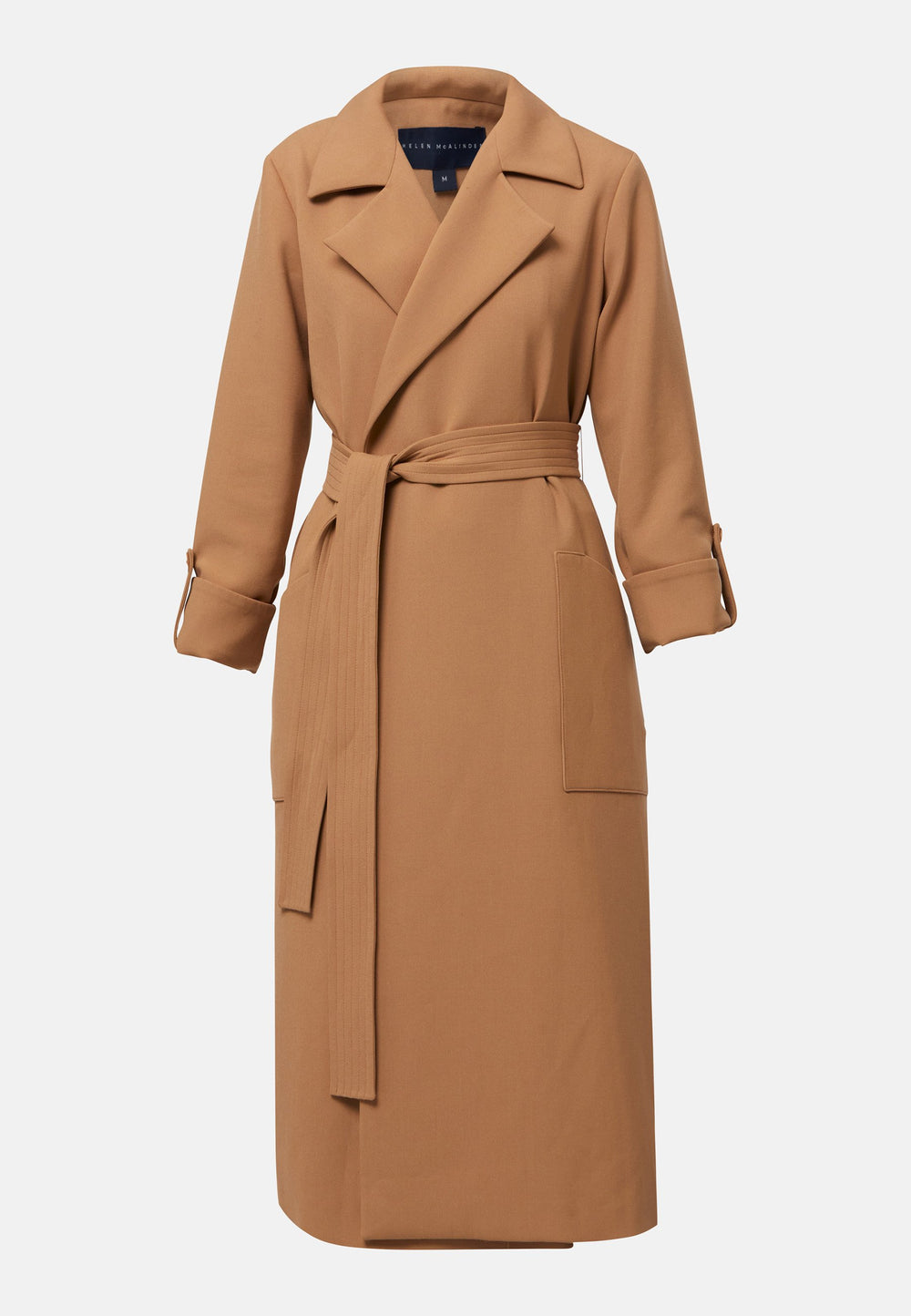 The Lydiah Coat is a minimalist trench style in camel. This coat features a relaxed, straight silhouette with a detachable self-tie belt, and front patch pockets. The design includes buttoned turn back cuffs and a wide lapel. Pair with our coordinating Lyra trouser for a chic monochromatic look.