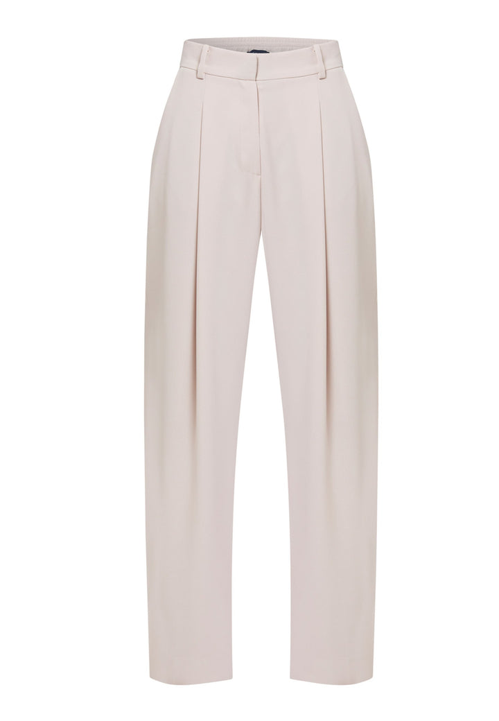 Woman wearing natural pearl pants