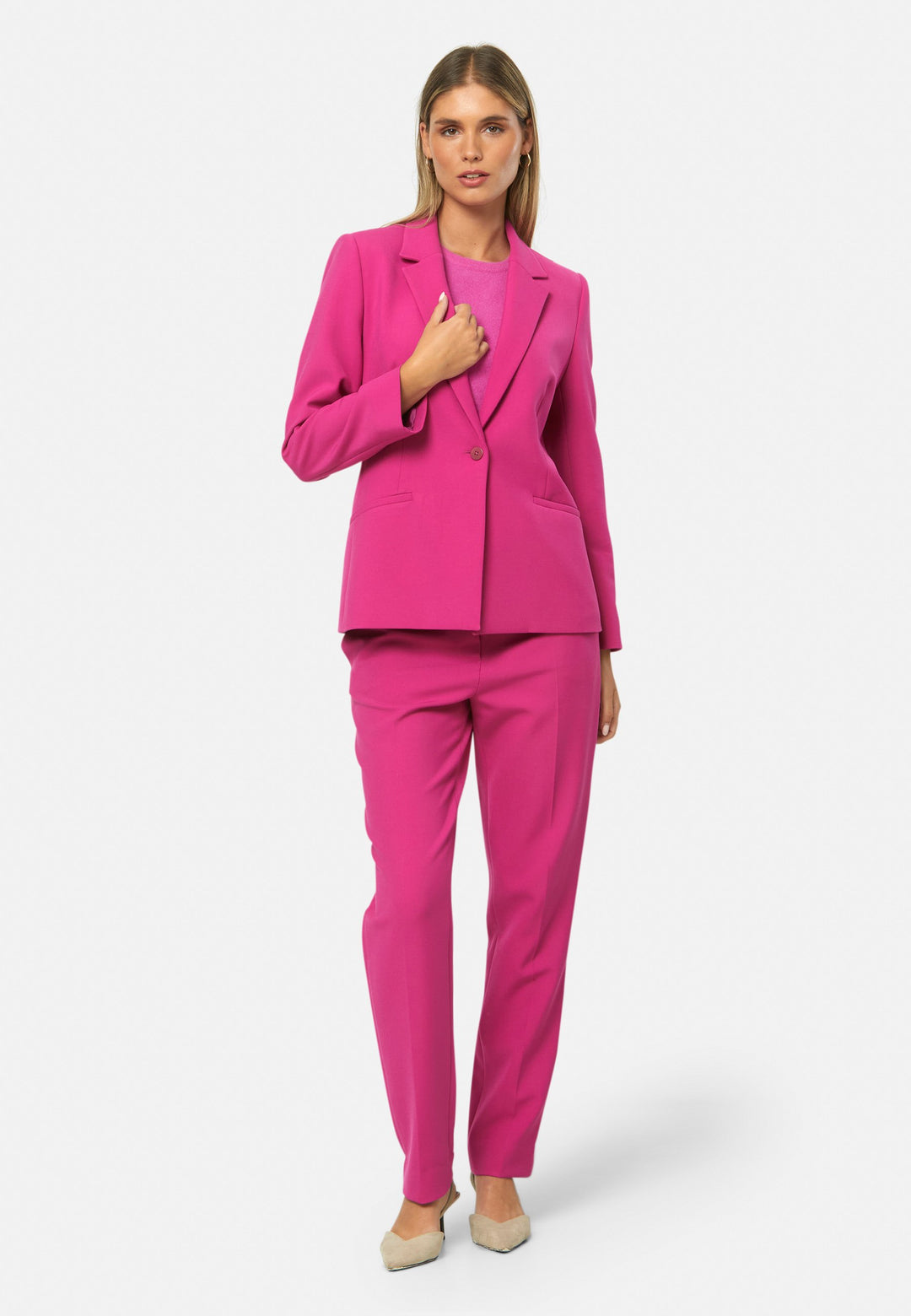 woman wearing pink suit