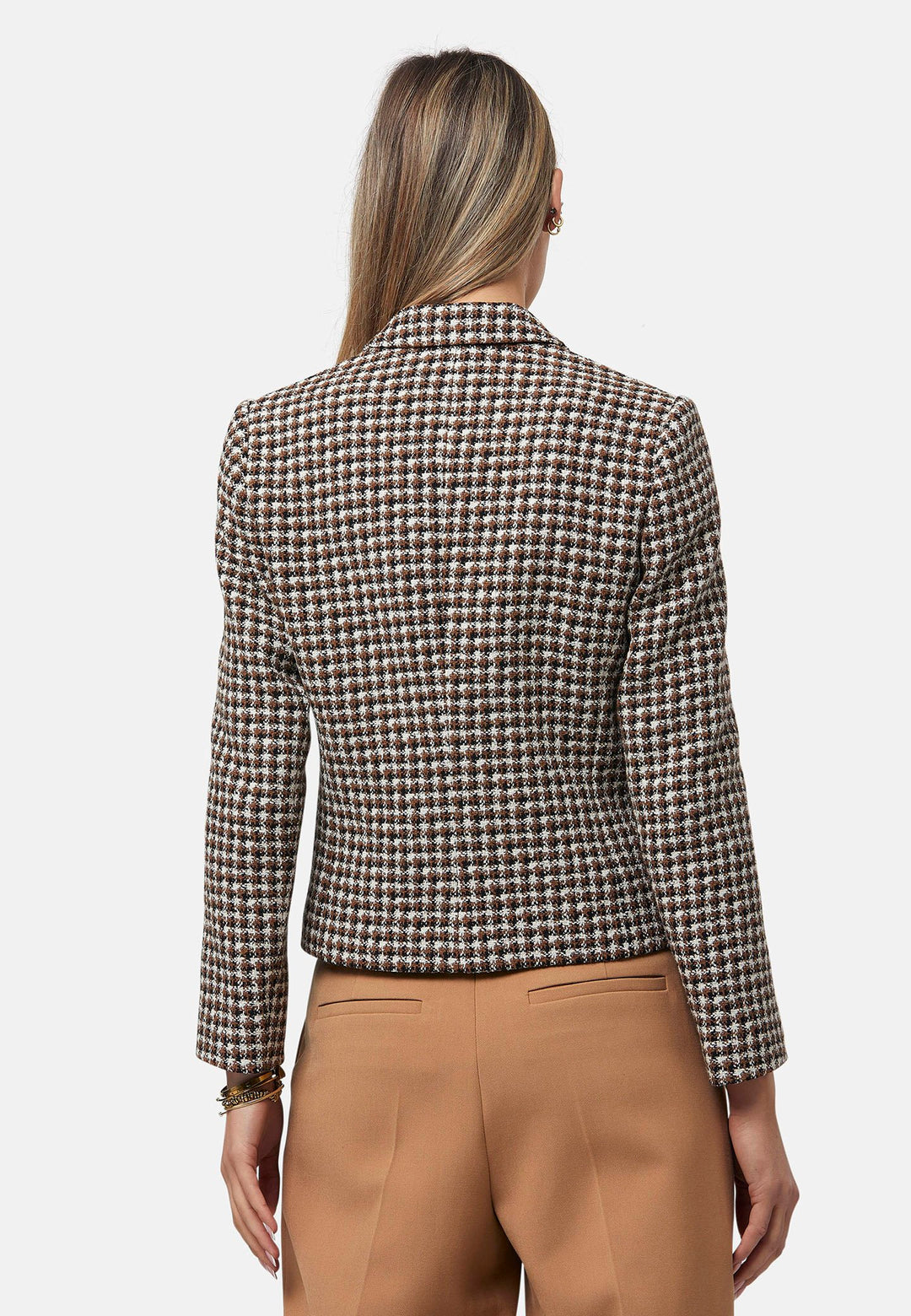 This bouclé tailored blazer features a classic houndstooth pattern in earthy brown, black, and white tones. Designed with a structured fit, it includes a notched lapel, three-button front closure, and flap pockets for a timeless look. Perfect for elevating both office and casual outfits.