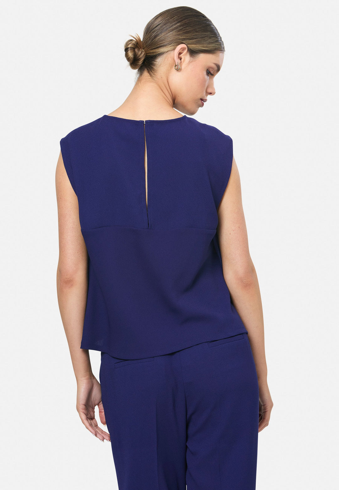 model wearing Nicki Ink Blue Top