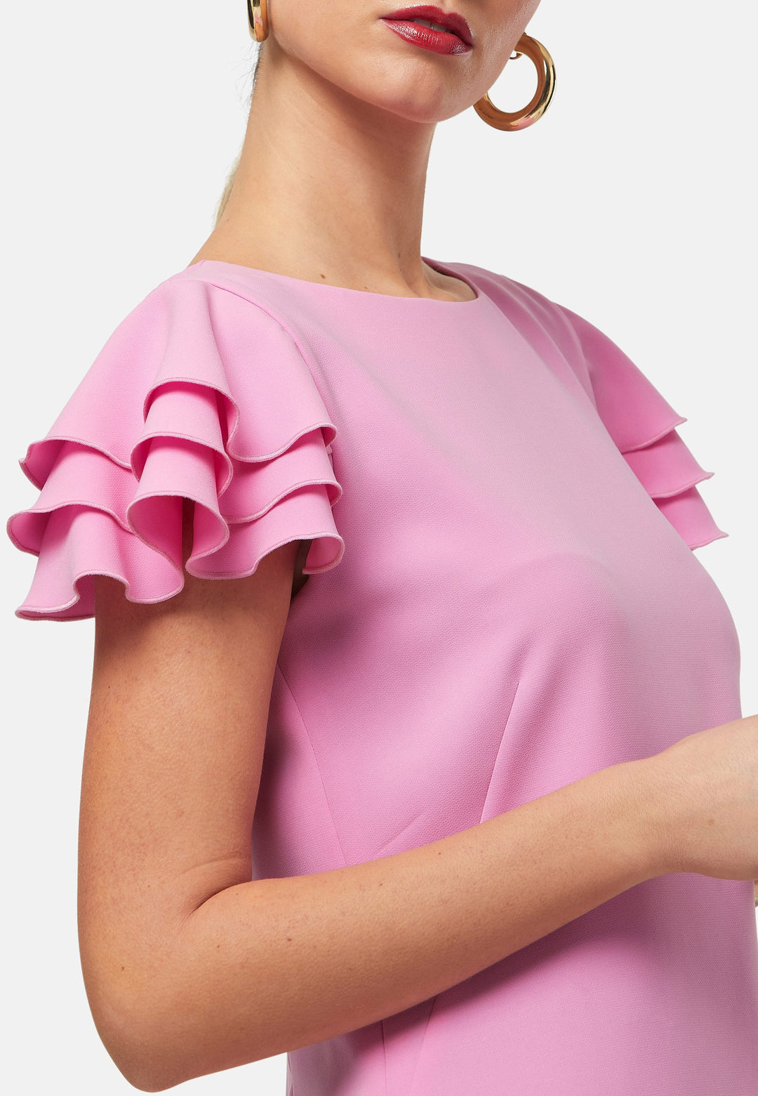 Turn heads at your upcoming occasions in this sheath shift dress. The standout feature is its tiered ruffle sleeves, adding a touch of playful elegance. Perfect for formal luncheons, weddings or evening outings.