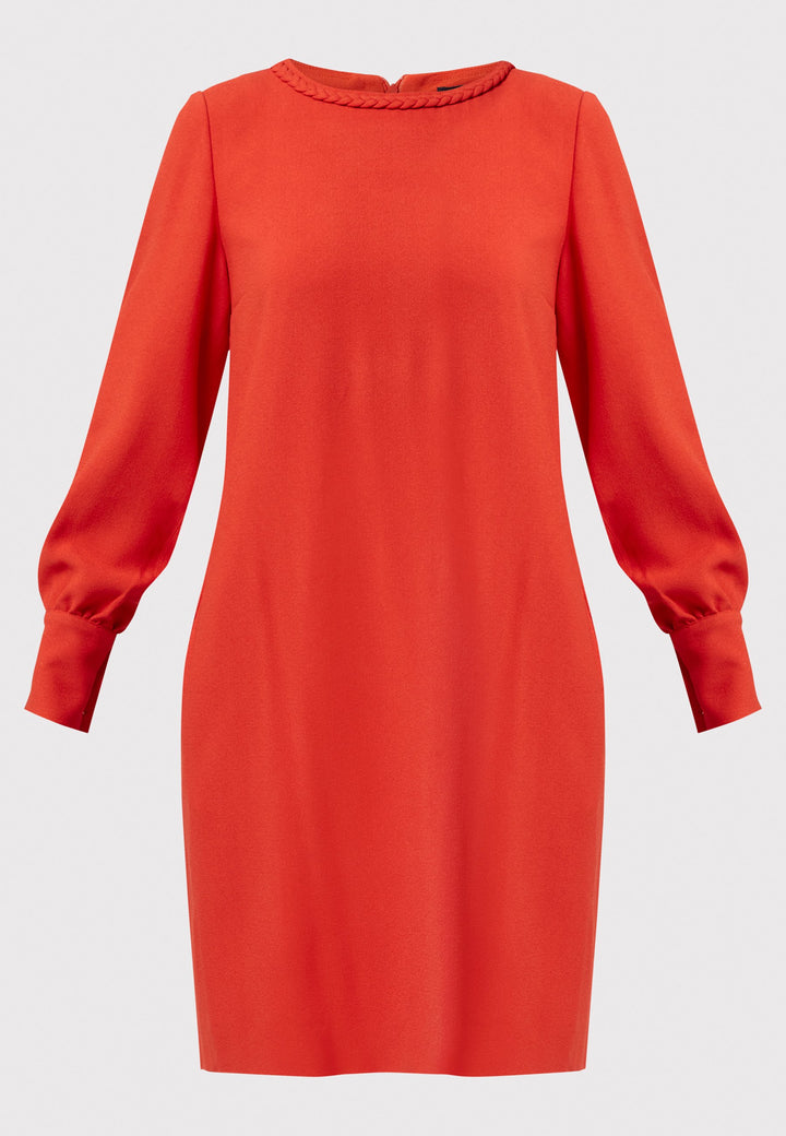 The Rachel Shift Dress is crafted in a vibrant burnt orange acetate and viscose blend crepe. This modern shift dress features a round neckline trimmed with an elegant plait trim. The relaxed-fit sleeves gather softly into buttoned cuffs, adding a refined touch. With convenient side pockets and a knee-length skirt, this dress is both stylish and practical. Perfect for work, wine or dining.