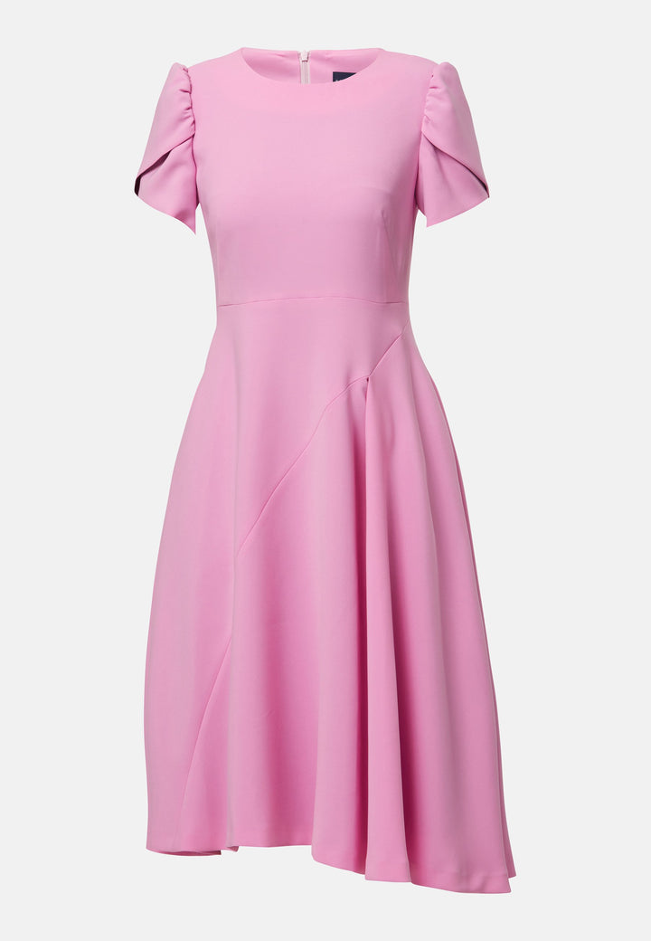 The Vera midi dress in a feminine pink hue features a flattering fit-and-flare silhouette. With short, puffed sleeves and subtle seam details. Crafted from our signature tricotine with a touch of elastane to ensure ease of movement. Perfect for formal luncheons, weddings or evening outings.