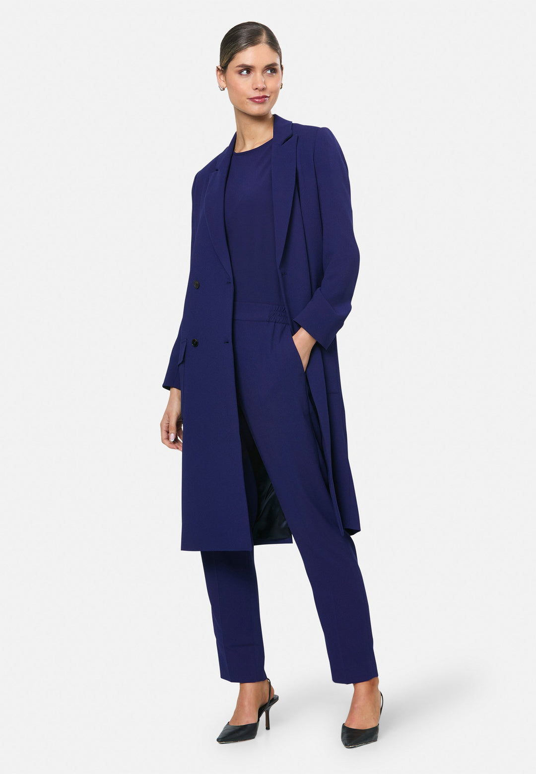 model wearing Victoria Ink Blue Coat