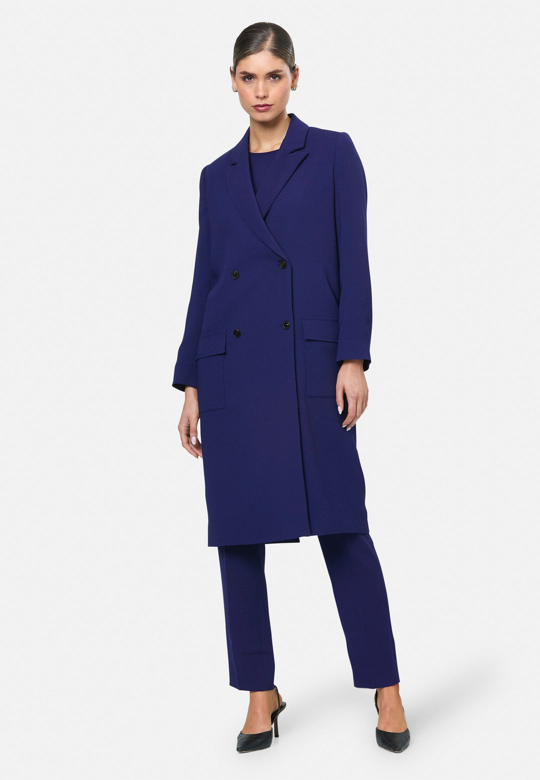 model wearing Victoria Ink Blue Coat