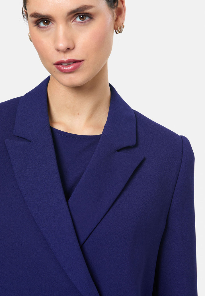 model wearing Victoria Ink Blue Coat