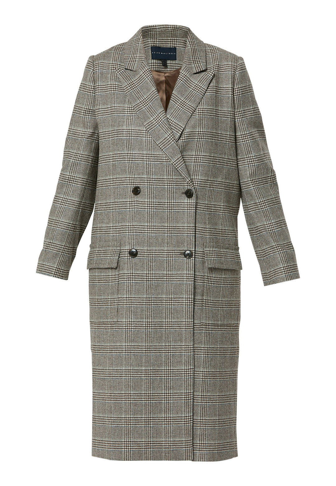 Introducing the Victoria Coat, a contemporary silhouette crafted in Magee lamsbwool. This double-breasted coat, featuring patch pockets and falls below the knee, it exudes timeless sophistication. The Victoria Coat elevates your transition and winter wardrobe.