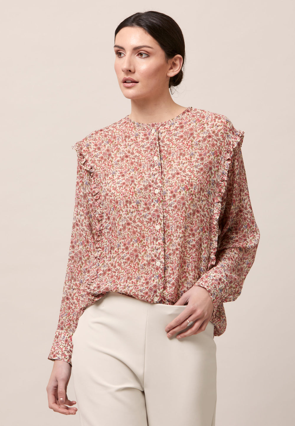 Give your everyday wardrobe an upgrade with the lauren jewel neck blouse. Cut in soft-touch silk blend crinkled georgette printed in feminine vintage inspired mini floral. A discreet ruffle runs from hem to hem over the shoulder. Lauren has been designed to add interest to the everyday.