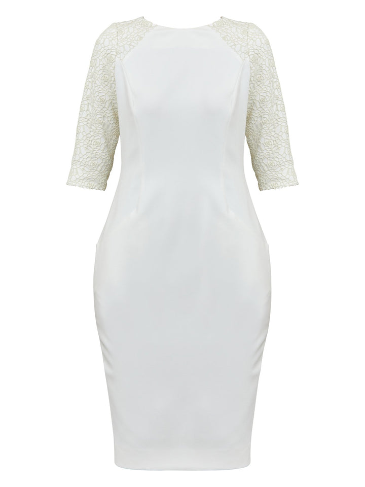 Juliet, A form-flattering, body-skimming silhouette in iconic white. Features a 3/4 sleeve with lace overlay. The skirt falls to a demure finish below the knee. Attending a summer wedding? Mother of the bride? Heading to the races? This is the dress for you.