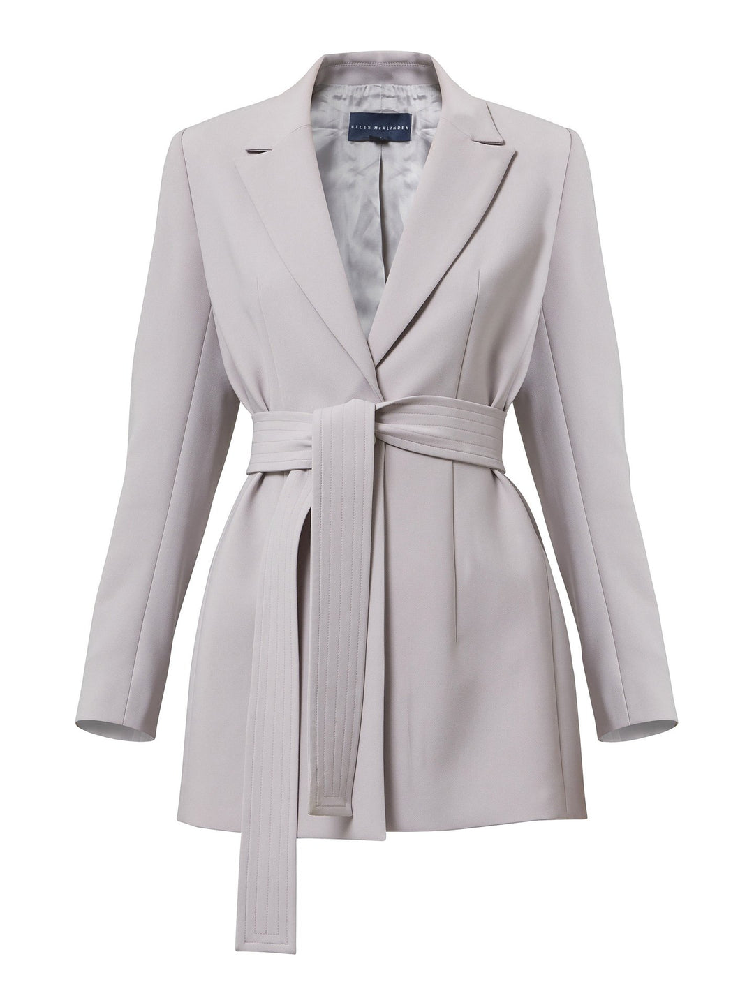 Zoey, a champagne tone belted jacket. crafted in luxe tricotine with a hint of stretch. Zoey oozes femenine confidence. Style with matching flared kelly pants for the ultimate look. The suit is back.